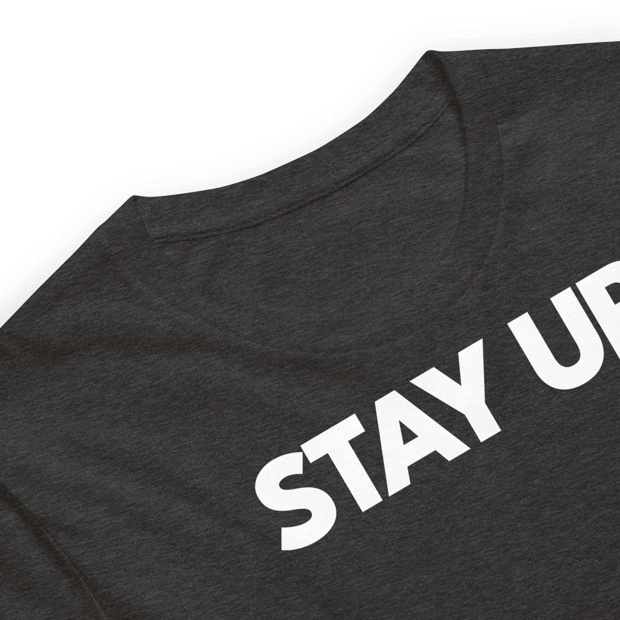 Close-up view of the Stay Up t-shirt with bold dark logo design, highlighting the quality print and empowering streetwear style.