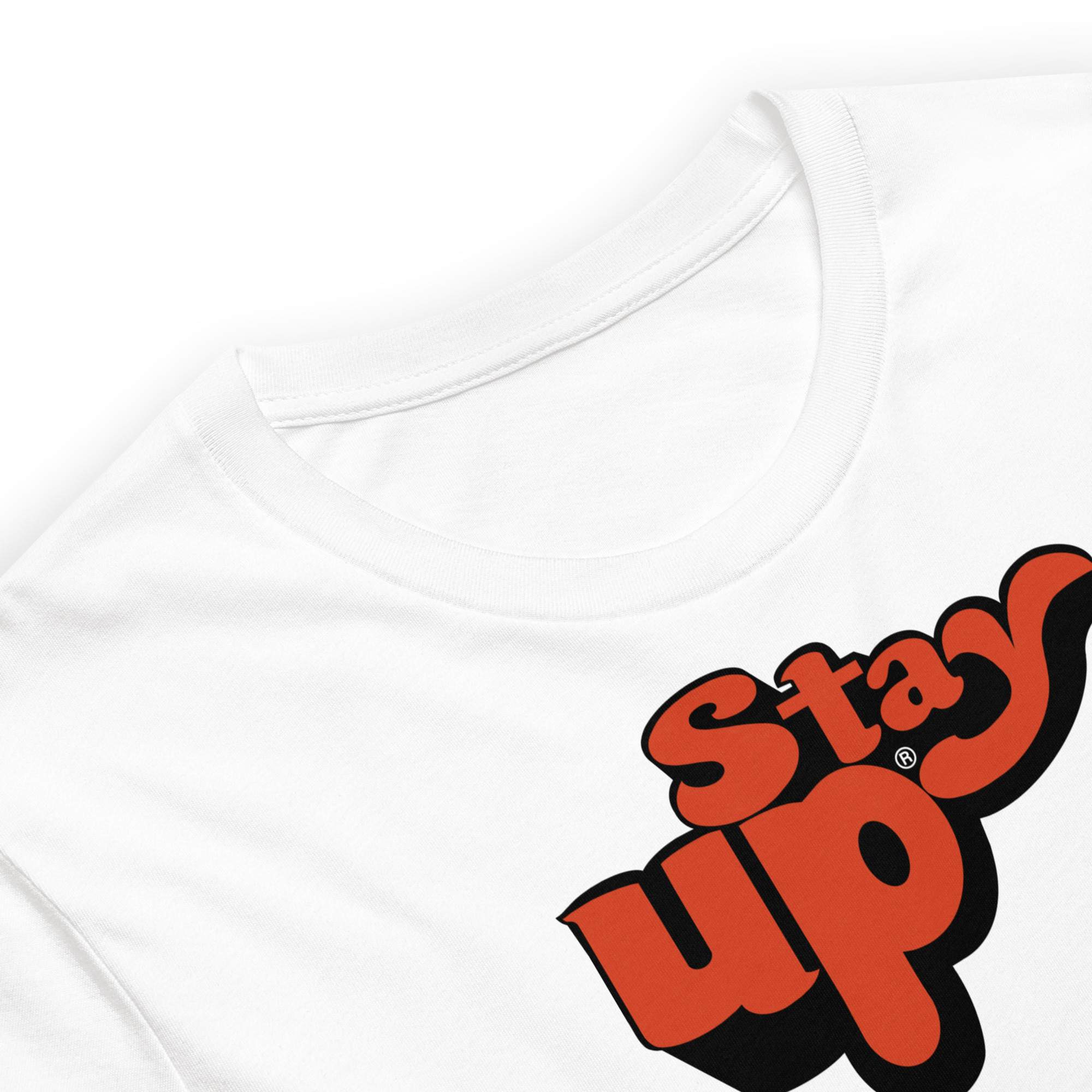 Close up of the Alex DeLeon Stay Up t shirt with the orange logo